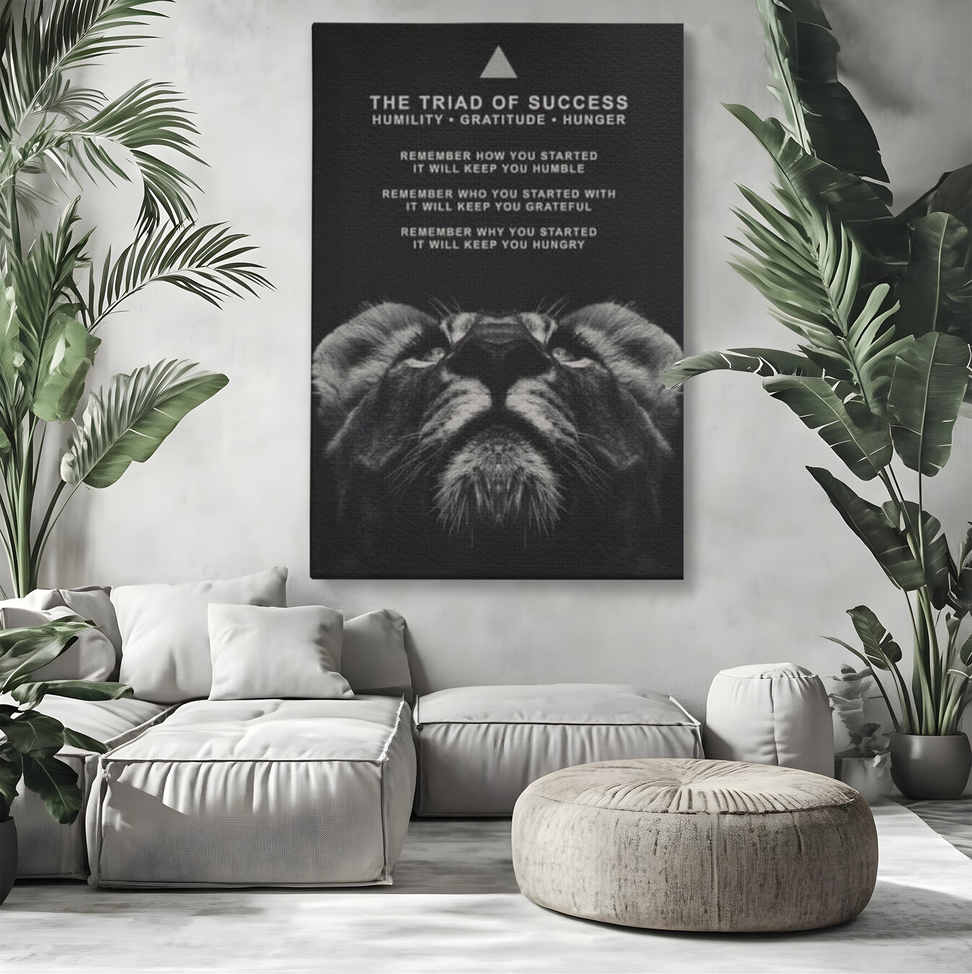 Tablou canvas cu tablou motivational cu cap de leu, fara rama, pe sasiu de lemn, pe perete intr-un living